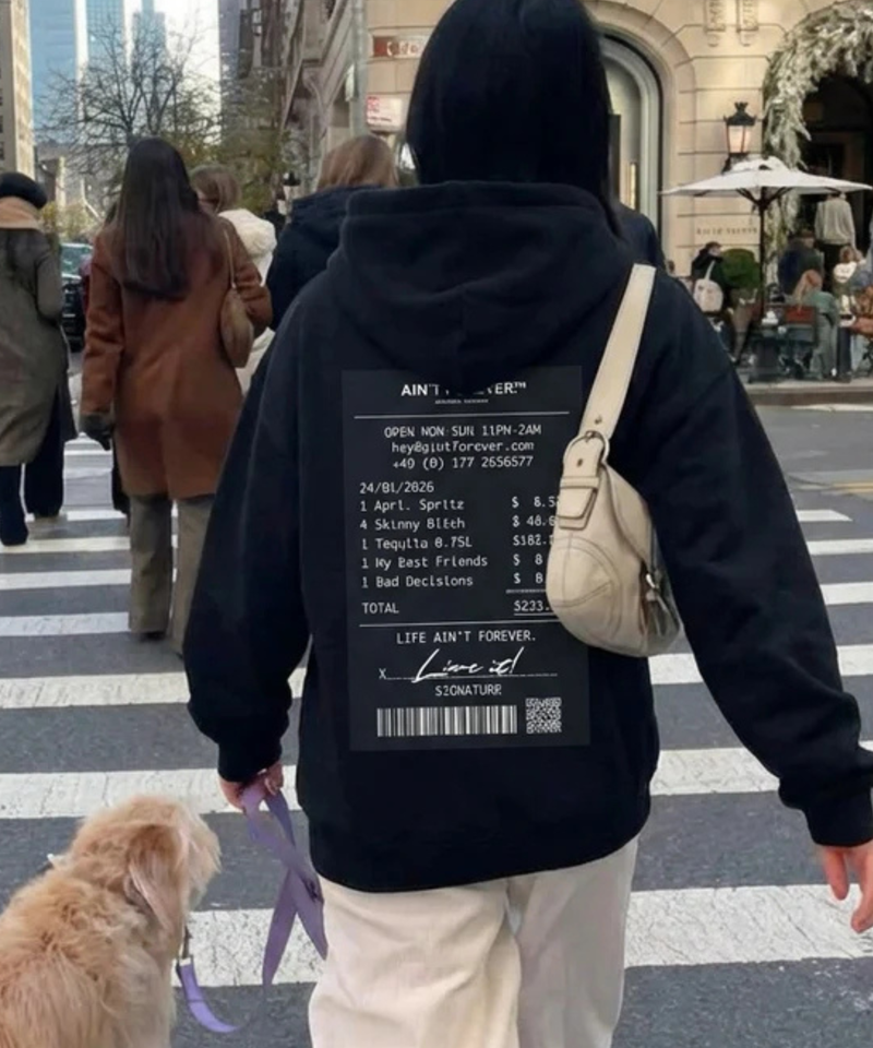 Female model wearing the Night Out Hoodie in a product image @model-female