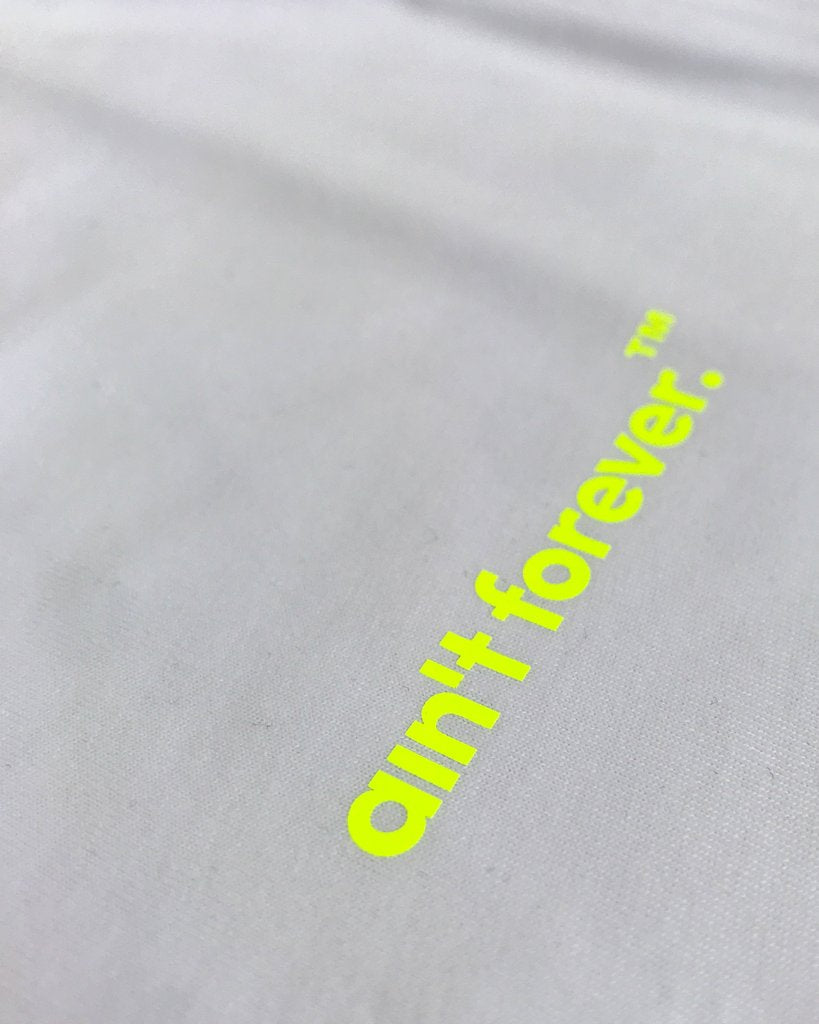 
                  
                    THE OVERSIZED LOGO T-SHIRT (WHITE / NEON)
                  
                